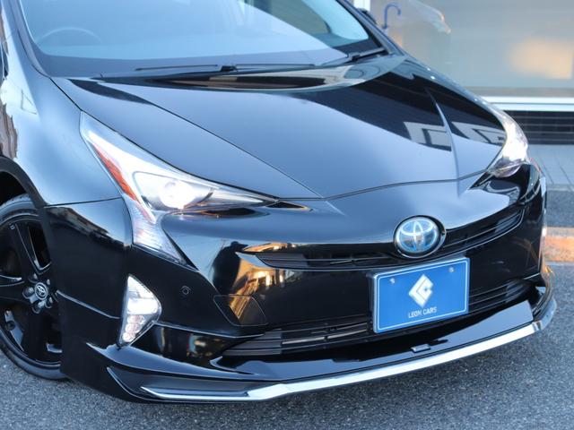 プリウス Ｓツーリングセレクション　モデリスタフルエアロ　セーフティセンスＬＥＤヘッド社外メモリーナビＢカメラ地デジＢＴ音楽ＡＣ１００Ｖスマートキー合皮シート前席シートヒーター純正１７ＡＷプッシュスタートＲフォグ革巻きＨステコンＥＴＣ（24枚目）