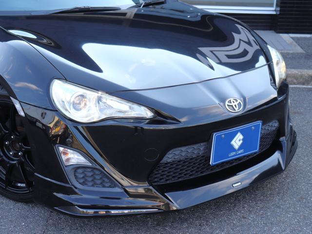 ８６ Ｇ　モデリスタエアロＳＳＲ１８インチＡＷ純正ＳＤナビＢカメラ地デジＢＴ音楽ＴＲＤトランクスポイラー　コーナーセンサーＥＴＣキーレス革巻きハンドル　ライトレベライザ　キーレス（17枚目）