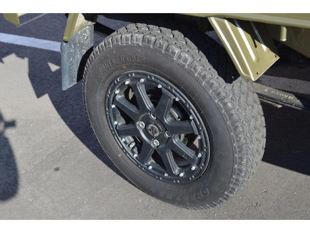 スタンダード 4WD 2インチリフトアップ バンパーガードパイプ 社外14インチアルミホイール マッドタイヤ 大型LEDフォグランプ フルセグナビ ETC(11枚目)