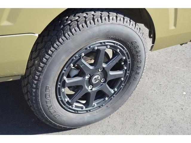 スタンダード 4WD 2インチリフトアップ バンパーガードパイプ 社外14インチアルミホイール マッドタイヤ 大型LEDフォグランプ フルセグナビ ETC(12枚目)