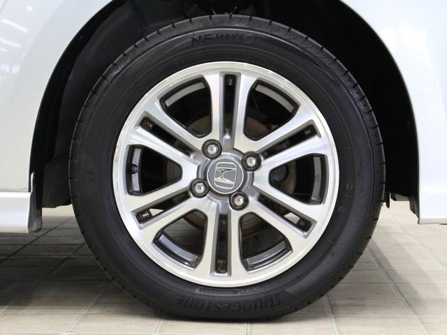 Ｎ－ＢＯＸカスタム Ｇ・Ｌパッケージ　ワンオーナー　禁煙車　メモリーナビ　フルセグ　ＣＤ　ＤＶＤ　音楽録音　ステアリングリモコン　リアカメラ　ＥＴＣ　両側パワースライドドア　オートエアコン　オートライト　ディスチャージライト　フォグライト（12枚目）