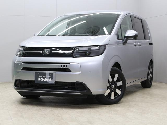 フリード エアーＥＸ　弊社試乗車　８インチナビ　フルセグ　Ｂｌｕｅｔｏｏｔｈ　リアカメラ　両側パワースライドドア　ステアリングリモコン　クルーズコントロール　オートエアコン　リアクーラー　シートヒーター　１５インチアルミ（5枚目）