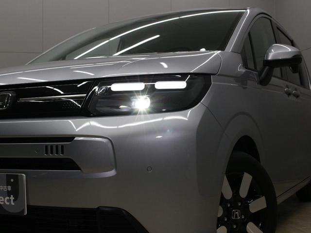 フリード エアーＥＸ　弊社試乗車　８インチナビ　フルセグ　Ｂｌｕｅｔｏｏｔｈ　リアカメラ　両側パワースライドドア　ステアリングリモコン　クルーズコントロール　オートエアコン　リアクーラー　シートヒーター　１５インチアルミ（6枚目）