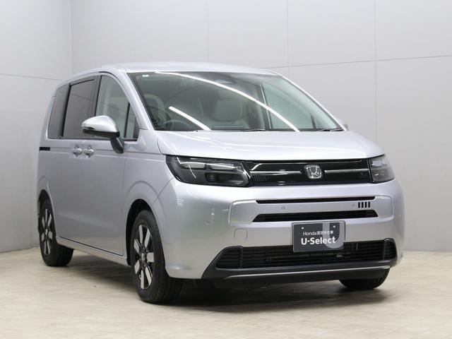 フリード エアーＥＸ　弊社試乗車　８インチナビ　フルセグ　Ｂｌｕｅｔｏｏｔｈ　リアカメラ　両側パワースライドドア　ステアリングリモコン　クルーズコントロール　オートエアコン　リアクーラー　シートヒーター　１５インチアルミ（10枚目）