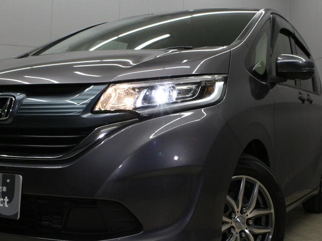 フリード Ｇ・ホンダセンシング　ワンオーナー　禁煙車　ＬＥＤライト　メモリーナビ　フルセグ　ＣＤ　ＤＶＤ　Ｂｌｕｅｔｏｏｔｈ　リアカメラ　ＥＴＣ　ドラレコ　両側パワースライドドア　オートライト　社外１５インチアルミ　スマートキー（7枚目）