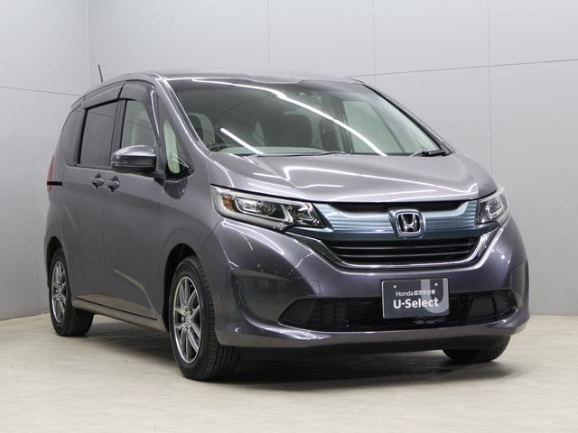 フリード Ｇ・ホンダセンシング　ワンオーナー　禁煙車　ＬＥＤライト　メモリーナビ　フルセグ　ＣＤ　ＤＶＤ　Ｂｌｕｅｔｏｏｔｈ　リアカメラ　ＥＴＣ　ドラレコ　両側パワースライドドア　オートライト　社外１５インチアルミ　スマートキー（9枚目）