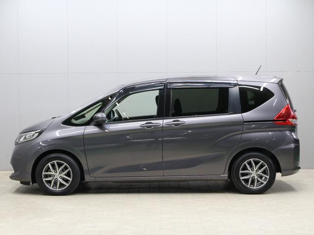 フリード Ｇ・ホンダセンシング　ワンオーナー　禁煙車　ＬＥＤライト　メモリーナビ　フルセグ　ＣＤ　ＤＶＤ　Ｂｌｕｅｔｏｏｔｈ　リアカメラ　ＥＴＣ　ドラレコ　両側パワースライドドア　オートライト　社外１５インチアルミ　スマートキー（16枚目）