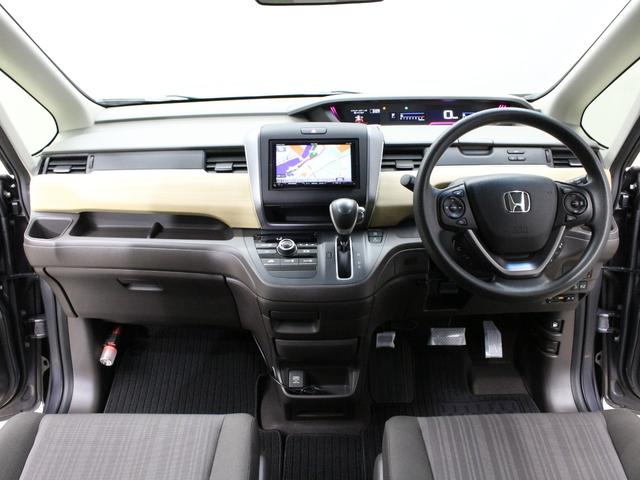 フリード Ｇ・ホンダセンシング　ワンオーナー　禁煙車　ＬＥＤライト　メモリーナビ　フルセグ　ＣＤ　ＤＶＤ　Ｂｌｕｅｔｏｏｔｈ　リアカメラ　ＥＴＣ　ドラレコ　両側パワースライドドア　オートライト　社外１５インチアルミ　スマートキー（20枚目）