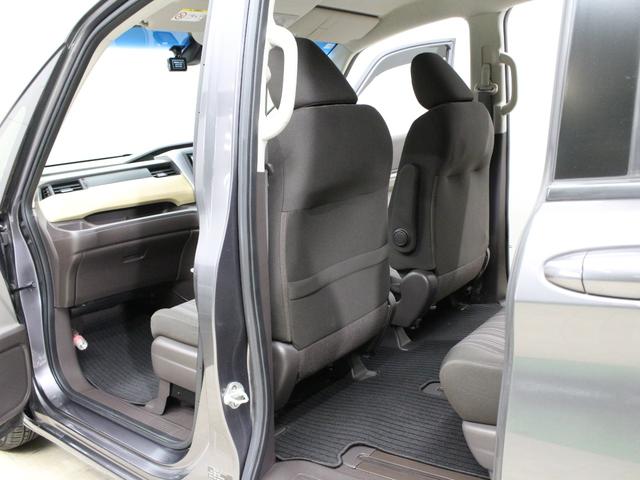 フリード Ｇ・ホンダセンシング　ワンオーナー　禁煙車　ＬＥＤライト　メモリーナビ　フルセグ　ＣＤ　ＤＶＤ　Ｂｌｕｅｔｏｏｔｈ　リアカメラ　ＥＴＣ　ドラレコ　両側パワースライドドア　オートライト　社外１５インチアルミ　スマートキー（24枚目）