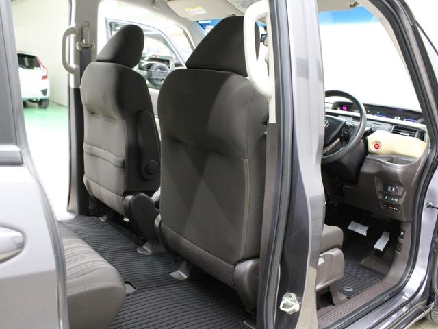 フリード Ｇ・ホンダセンシング　ワンオーナー　禁煙車　ＬＥＤライト　メモリーナビ　フルセグ　ＣＤ　ＤＶＤ　Ｂｌｕｅｔｏｏｔｈ　リアカメラ　ＥＴＣ　ドラレコ　両側パワースライドドア　オートライト　社外１５インチアルミ　スマートキー（25枚目）