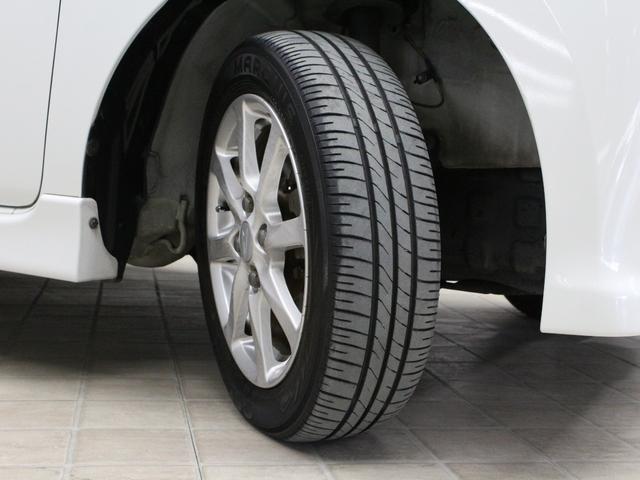 タント カスタムＸスペシャル　禁煙車　メモリーナビ　ＣＤ　フルセグ　オートエアコン　ディスチャージヘッドライト　スマートキー　パワースライドドア　ベンチシート　純正アルミ（4枚目）