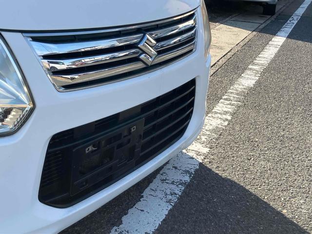 ワゴンＲ ＦＸ　アイドリングストップ　電動格納ミラー　ベンチシート　ＣＶＴ　盗難防止システム　ＡＢＳ　ＣＤ　ミュージックプレイヤー接続可　衝突安全ボディ　エアコン　パワーステアリング　パワーウィンドウ（17枚目）