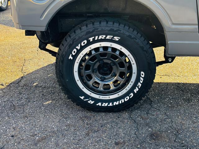 ジムニー ＨＣ　ＪＢ６４全塗装／増しリーフリフトアップ／ＬＥＤヘッドライト／ＬＥＤテールランプ／縞板ドアトリム／タイミングベルト交換済／圧縮測定済／オープンカントリーＭＴ／ＷＯＲＫ１６インチ／ディープコーンハンドル（28枚目）