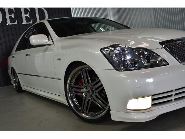 アスリートGパッケージ 黒革シート 車高調 社外19インチメッキホイール ワンオフマフラー メッキグリル メッキピラー フルエアロ トランクスポイラー ゴールドエンブレム シートヒーター 地デジ ETC スモーク施工済(23枚目)