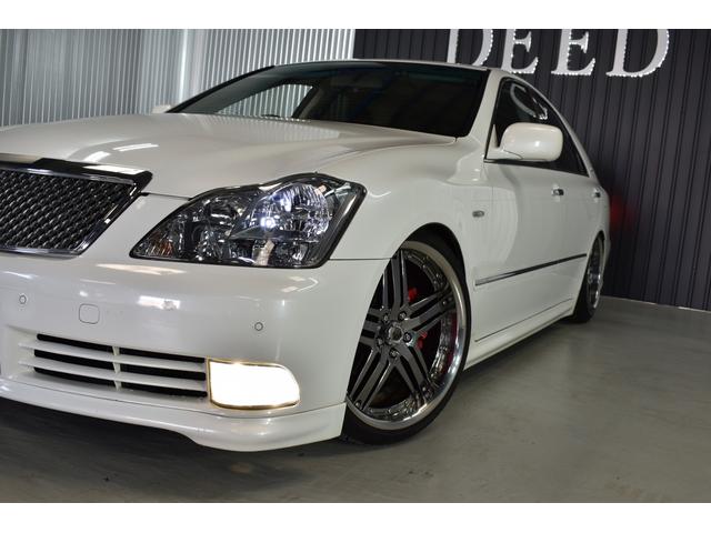 アスリートGパッケージ 黒革シート 車高調 社外19インチメッキホイール ワンオフマフラー メッキグリル メッキピラー フルエアロ トランクスポイラー ゴールドエンブレム シートヒーター 地デジ ETC スモーク施工済(24枚目)