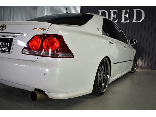 アスリートGパッケージ 黒革シート 車高調 社外19インチメッキホイール ワンオフマフラー メッキグリル メッキピラー フルエアロ トランクスポイラー ゴールドエンブレム シートヒーター 地デジ ETC スモーク施工済(27枚目)