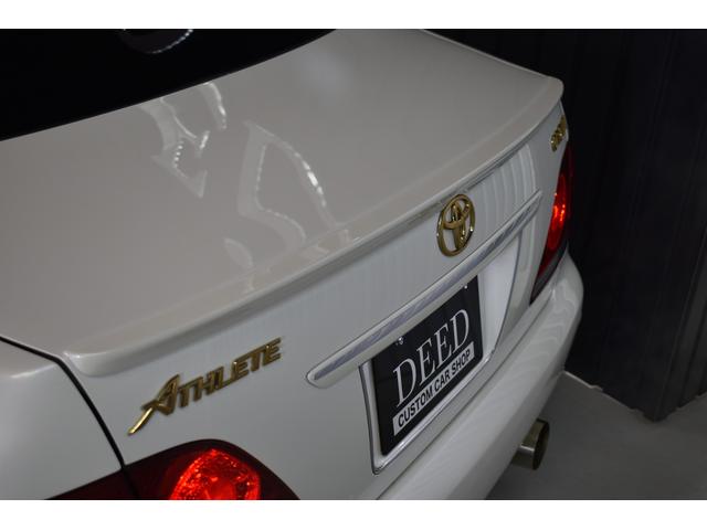 アスリートGパッケージ 黒革シート 車高調 社外19インチメッキホイール ワンオフマフラー メッキグリル メッキピラー フルエアロ トランクスポイラー ゴールドエンブレム シートヒーター 地デジ ETC スモーク施工済(31枚目)