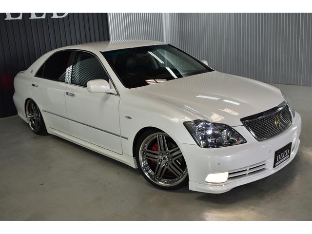 アスリートGパッケージ 黒革シート 車高調 社外19インチメッキホイール ワンオフマフラー メッキグリル メッキピラー フルエアロ トランクスポイラー ゴールドエンブレム シートヒーター 地デジ ETC スモーク施工済(59枚目)
