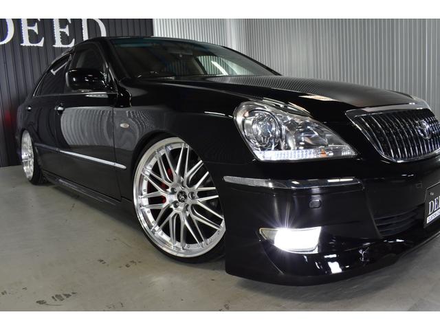 クラウンマジェスタ Cタイプ Fパッケージ 黒革シート サンルーフ 純正HDDナビ フルエアロ エアサスコントローラー 新品20インチ 新品タイヤ LEDフォグ カラーキャリパー DVD再生可能 全席シートヒーター ETC バックカメラ(24枚目)