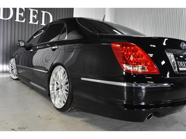 クラウンマジェスタ Cタイプ Fパッケージ 黒革シート サンルーフ 純正HDDナビ フルエアロ エアサスコントローラー 新品20インチ 新品タイヤ LEDフォグ カラーキャリパー DVD再生可能 全席シートヒーター ETC バックカメラ(27枚目)