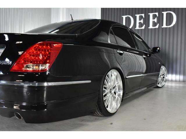 クラウンマジェスタ Cタイプ Fパッケージ 黒革シート サンルーフ 純正HDDナビ フルエアロ エアサスコントローラー 新品20インチ 新品タイヤ LEDフォグ カラーキャリパー DVD再生可能 全席シートヒーター ETC バックカメラ(28枚目)