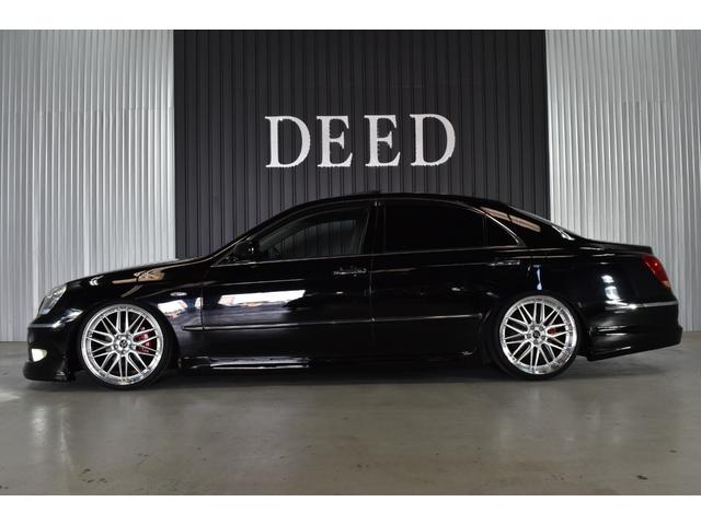 クラウンマジェスタ Cタイプ Fパッケージ 黒革シート サンルーフ 純正HDDナビ フルエアロ エアサスコントローラー 新品20インチ 新品タイヤ LEDフォグ カラーキャリパー DVD再生可能 全席シートヒーター ETC バックカメラ(29枚目)