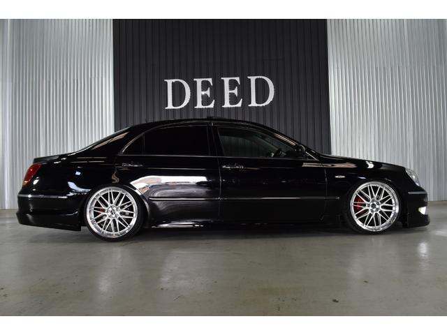 クラウンマジェスタ Cタイプ Fパッケージ 黒革シート サンルーフ 純正HDDナビ フルエアロ エアサスコントローラー 新品20インチ 新品タイヤ LEDフォグ カラーキャリパー DVD再生可能 全席シートヒーター ETC バックカメラ(30枚目)