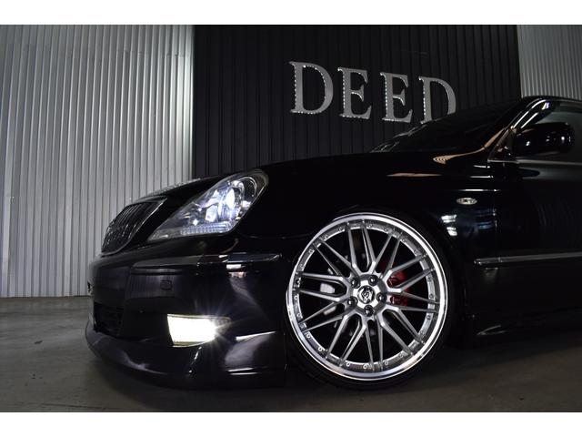 クラウンマジェスタ Cタイプ Fパッケージ 黒革シート サンルーフ 純正HDDナビ フルエアロ エアサスコントローラー 新品20インチ 新品タイヤ LEDフォグ カラーキャリパー DVD再生可能 全席シートヒーター ETC バックカメラ(31枚目)