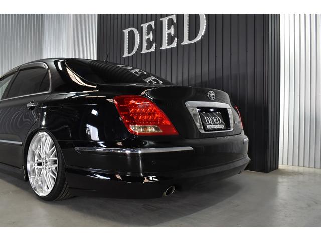 クラウンマジェスタ Cタイプ Fパッケージ 黒革シート サンルーフ 純正HDDナビ フルエアロ エアサスコントローラー 新品20インチ 新品タイヤ LEDフォグ カラーキャリパー DVD再生可能 全席シートヒーター ETC バックカメラ(52枚目)