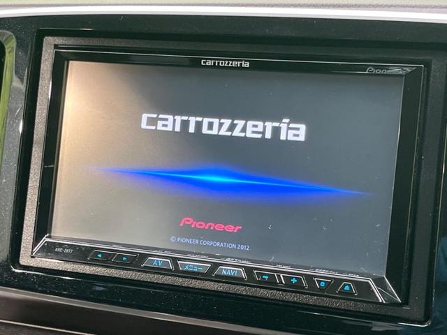 プレミアム・Ｌパッケージ　禁煙車　純正ＳＤナビフルセグ　バックカメラ　ＨＩＤヘッドライト　プッシュスタート　スマートキー　純正１４インチアルミホイール　サイドバイザー　プライバシーガラス　電動格納ミラー　オートエアコン(3枚目)