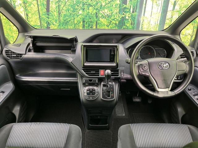 ヴォクシー ZS 両側電動ドア 後席モニター バックカメラ 禁煙車 ドラレコ スマートキー LEDヘッド ビルトインETC オートライト デュアルエアコン 純正16インチアルミ Bluetooth CD DVD再生(2枚目)