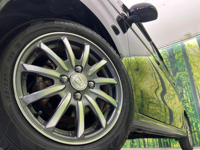 N-WGNカスタム G SDナビ 禁煙車 スマートキー HIDヘッド オートライト オートエアコン 純正14インチアルミ CD トラクションコントロール 衝突安全ボディ プライバシーガラス ドアバイザー 電動格納ミラー(13枚目)