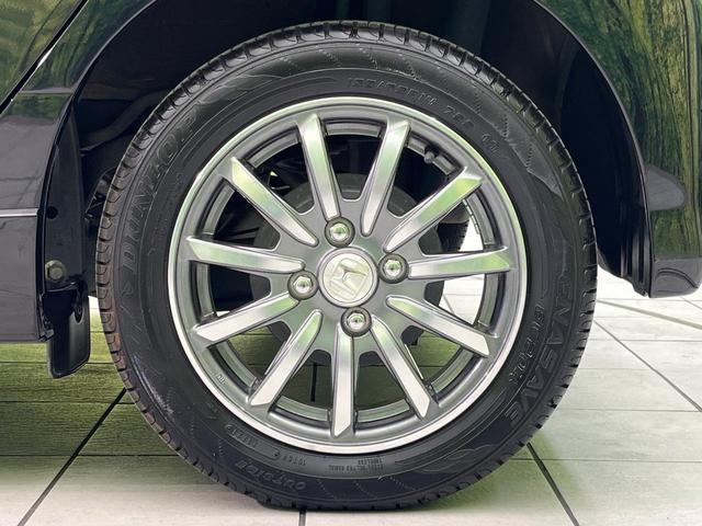 N-WGNカスタム G SDナビ 禁煙車 スマートキー HIDヘッド オートライト オートエアコン 純正14インチアルミ CD トラクションコントロール 衝突安全ボディ プライバシーガラス ドアバイザー 電動格納ミラー(24枚目)