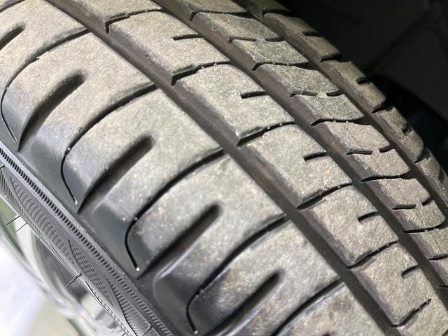 N-WGNカスタム G SDナビ 禁煙車 スマートキー HIDヘッド オートライト オートエアコン 純正14インチアルミ CD トラクションコントロール 衝突安全ボディ プライバシーガラス ドアバイザー 電動格納ミラー(25枚目)