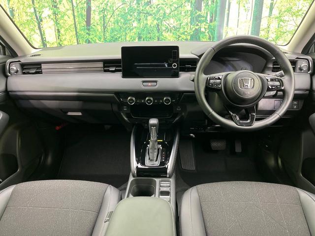 ヴェゼル e:HEV Z 純正9インチナビ バックカメラ ホンダセンシング レーダークルーズ 禁煙車 電動リアゲート ハーフレザーシート コーナーセンサー スマートキー LEDヘッド ETC2.0 オートハイビーム(2枚目)