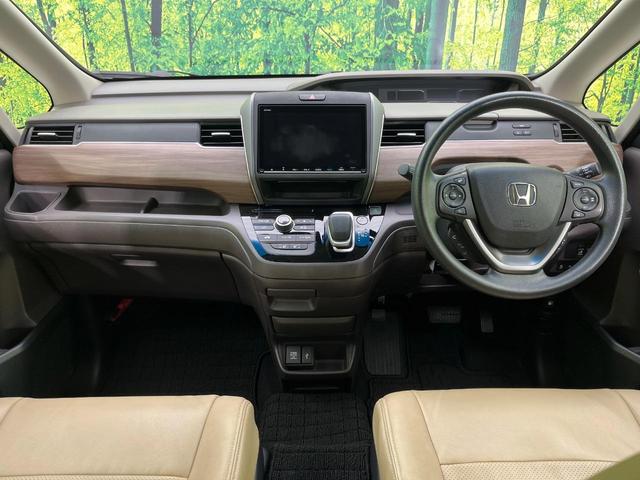 フリードハイブリッド ハイブリッド・Ｇ　純正９型ナビ　両側電動ドア　バックカメラ　衝突軽減システム　レーダークルーズ　禁煙車　ドラレコ　スマートキー　ＬＥＤヘッド　ＥＴＣ　オートライト　オートエアコン　Ｂｌｕｅｔｏｏｔｈ　ＣＤ　ＤＶＤ再生（2枚目）