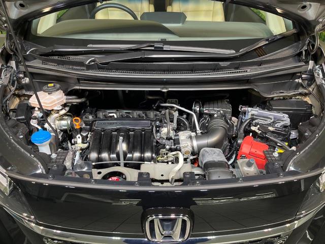 フリードハイブリッド ハイブリッド・Ｇ　純正９型ナビ　両側電動ドア　バックカメラ　衝突軽減システム　レーダークルーズ　禁煙車　ドラレコ　スマートキー　ＬＥＤヘッド　ＥＴＣ　オートライト　オートエアコン　Ｂｌｕｅｔｏｏｔｈ　ＣＤ　ＤＶＤ再生（18枚目）