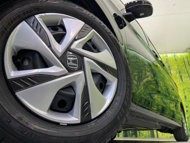 フリードハイブリッド ハイブリッド・Ｇ　純正９型ナビ　両側電動ドア　バックカメラ　衝突軽減システム　レーダークルーズ　禁煙車　ドラレコ　スマートキー　ＬＥＤヘッド　ＥＴＣ　オートライト　オートエアコン　Ｂｌｕｅｔｏｏｔｈ　ＣＤ　ＤＶＤ再生（25枚目）