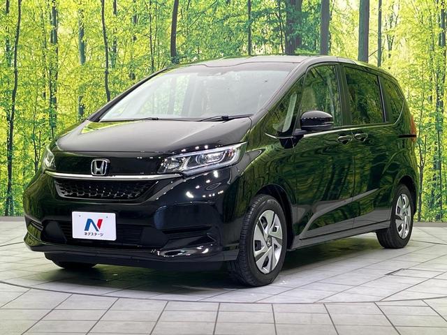 フリードハイブリッド ハイブリッド・Ｇ　純正９型ナビ　両側電動ドア　バックカメラ　衝突軽減システム　レーダークルーズ　禁煙車　ドラレコ　スマートキー　ＬＥＤヘッド　ＥＴＣ　オートライト　オートエアコン　Ｂｌｕｅｔｏｏｔｈ　ＣＤ　ＤＶＤ再生（27枚目）