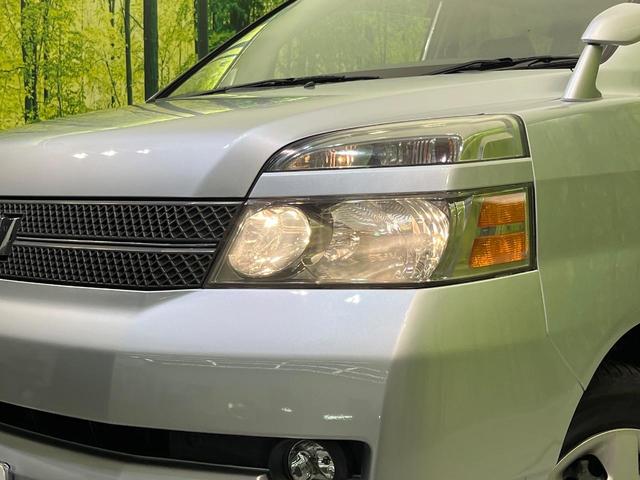 ヴォクシー Ｘ　後席モニター　純正ＨＤＤナビ　バックカメラ　禁煙車　ＥＴＣ　オートエアコン　ＣＤ　ＤＶＤ再生　ＴＶ視聴可能　電動格納ミラー（13枚目）