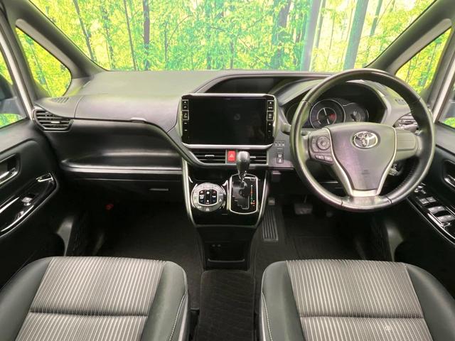 ヴォクシー ＺＳ　煌　両側電動ドア　ＢＩＧ－Ｘ１１型ナビ　１２．８型後席モニター　バックカメラ　衝突被害軽減システム　禁煙車　コーナーセンサー　スマートキー　ＬＥＤヘッド　ビルトインＥＴＣ　クルコン　純正１６インチアルミ（2枚目）