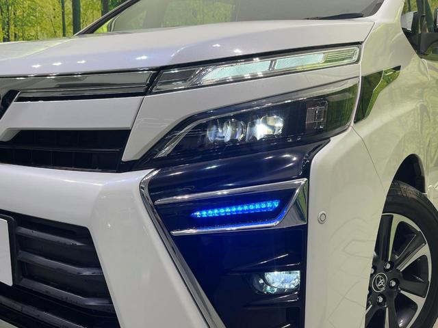 ヴォクシー ＺＳ　煌　両側電動ドア　ＢＩＧ－Ｘ１１型ナビ　１２．８型後席モニター　バックカメラ　衝突被害軽減システム　禁煙車　コーナーセンサー　スマートキー　ＬＥＤヘッド　ビルトインＥＴＣ　クルコン　純正１６インチアルミ（13枚目）