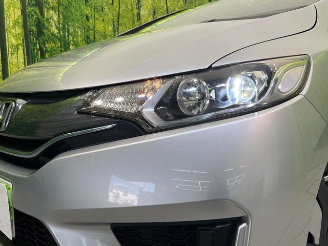 フィットハイブリッド Ｆパッケージ　ＳＤナビ　禁煙車　ドラレコ　スマートキー　ＬＥＤヘッドライト　ＥＴＣ　オートライト　オートエアコン　Ｂｌｕｅｔｏｏｔｈ　ＣＤ　ＤＶＤ再生　フルセグ　横滑り防止装置（12枚目）