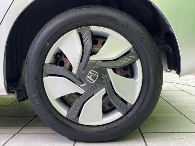 フィットハイブリッド Ｆパッケージ　ＳＤナビ　禁煙車　ドラレコ　スマートキー　ＬＥＤヘッドライト　ＥＴＣ　オートライト　オートエアコン　Ｂｌｕｅｔｏｏｔｈ　ＣＤ　ＤＶＤ再生　フルセグ　横滑り防止装置（52枚目）