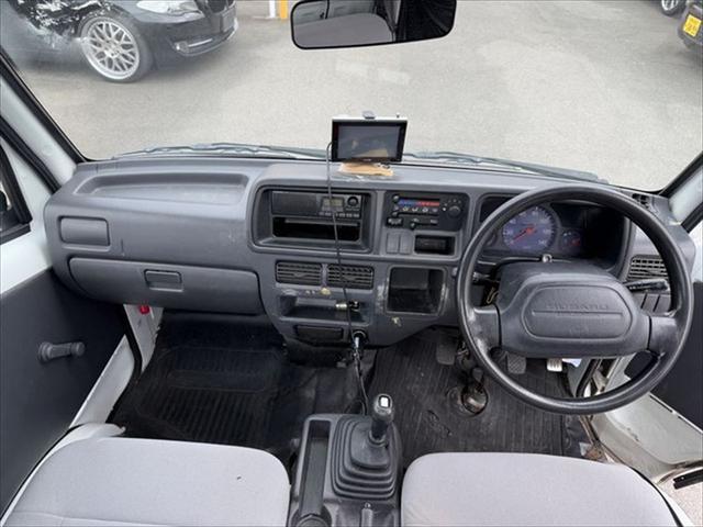 サンバートラック ＴＢ　プロフェッショナル　４ＷＤ　５ＭＴ　ナビ　エアコン　運転席エアバッグ（12枚目）