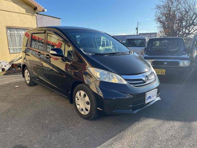 フリード Ｇ　ジャストセレクション　ドライブレコーダー　ＥＴＣ　ナビ　ＴＶ　両側電動スライドドア　スマートキー　電動格納ミラー　３列シート　ウォークスルー　ＣＶＴ　ＣＤ　ＤＶＤ再生　ＵＳＢ　Ｂｌｕｅｔｏｏｔｈ　盗難防止システム（13枚目）