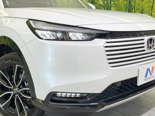 ヴェゼル e:HEV Z 登録済未使用車 全周囲カメラ 衝突被害軽減システム レーダークルーズ 電動リアゲート ハーフレザーシート コーナーセンサー スマートキー LEDヘッド ETC2.0 車線逸脱警報 ワンオーナー(11枚目)