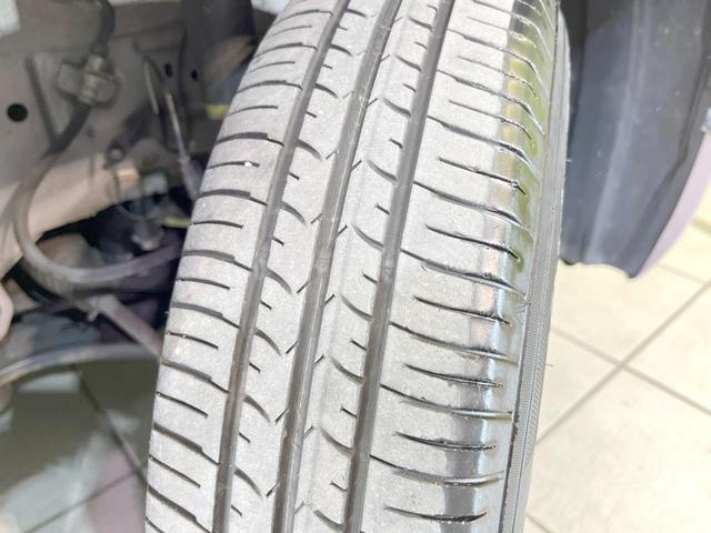 パッソ Ｘ　クツロギ　禁煙車　純正ＳＤナビ　バックカメラ　Ｂｌｕｅｔｏｏｔｈ　ＣＤ　ＤＶＤ再生　地デジ　衝突安全ボディ　電動格納ミラー　トラクションコントロール（35枚目）