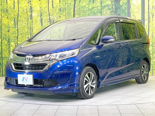 フリードハイブリッド ハイブリッド・Ｇホンダセンシング　両側電動ドア　バックカメラ　衝突被害軽減システム　レーダークルーズ　禁煙車　ハーフレザーシート　ＬＥＤヘッド　ビルトインＥＴＣ　純正１５インチアルミ　車線逸脱警報　オートライト　オートエアコン（16枚目）
