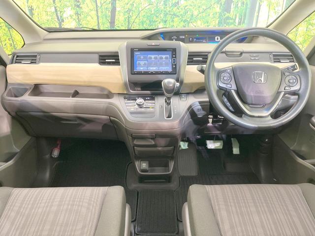 フリード Ｇ・ホンダセンシング　純正ナビ　両側電動ドア　バックカメラ　衝突被害軽減システム　レーダークルーズ　禁煙車　ドラレコ　スマートキー　ＬＥＤヘッド　ビルトインＥＴＣ　車線逸脱警報　オートライト　オートエアコン（2枚目）